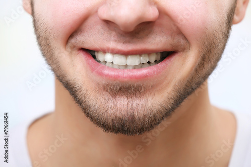 Smiling man after visit den...