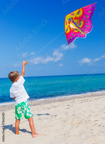 Boy with kite.