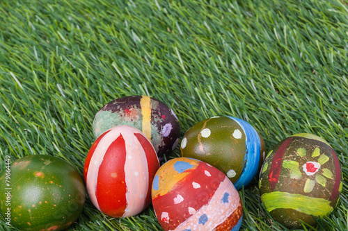 Happy easter eggs group on grass,can use as background for god f photo