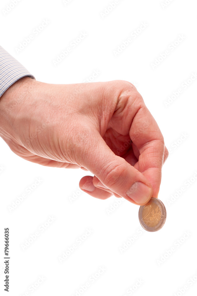 the Euro coin in the man's hand the Euro coin in the man's hand