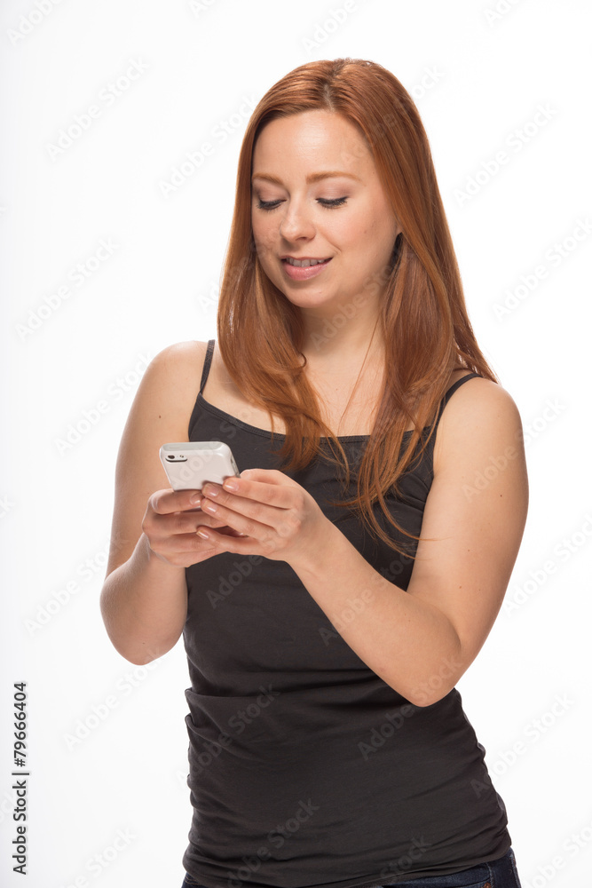 Young Caucasian woman texting on smart phone Young Caucasian woman texting on smart phone