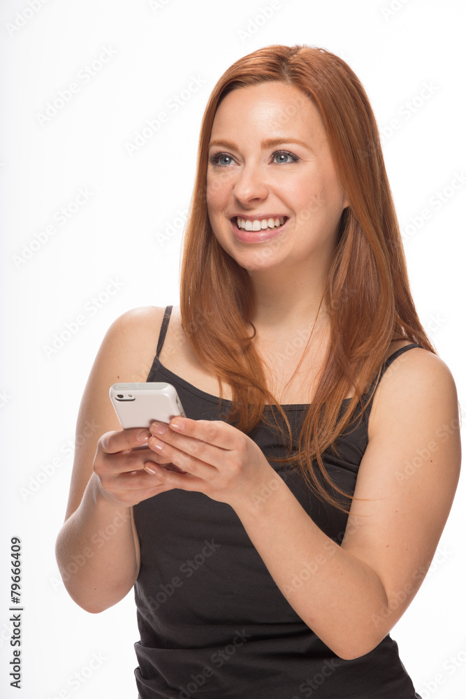 Young Caucasian woman texting on smart phone Young Caucasian woman texting on smart phone