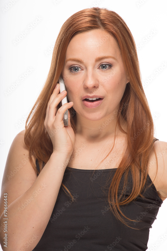 Young Caucasian woman talking on cell phone Young Caucasian woman talking on cell phone