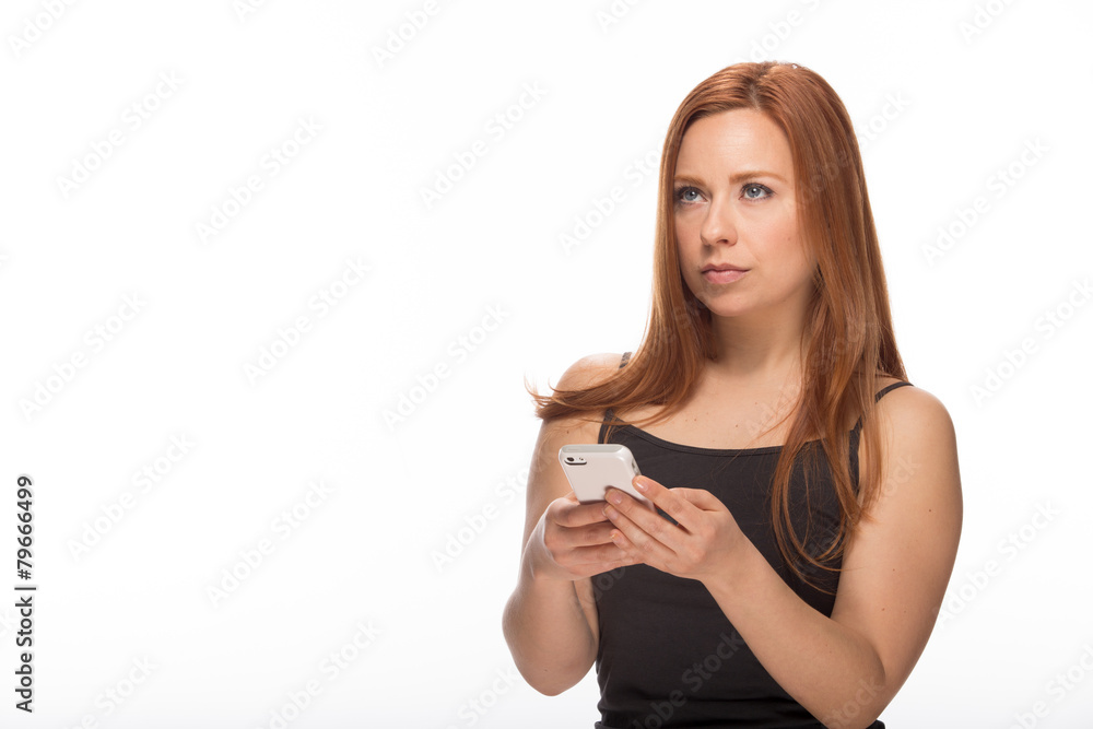 Young Caucasian woman texting on smart phone Young Caucasian woman texting on smart phone