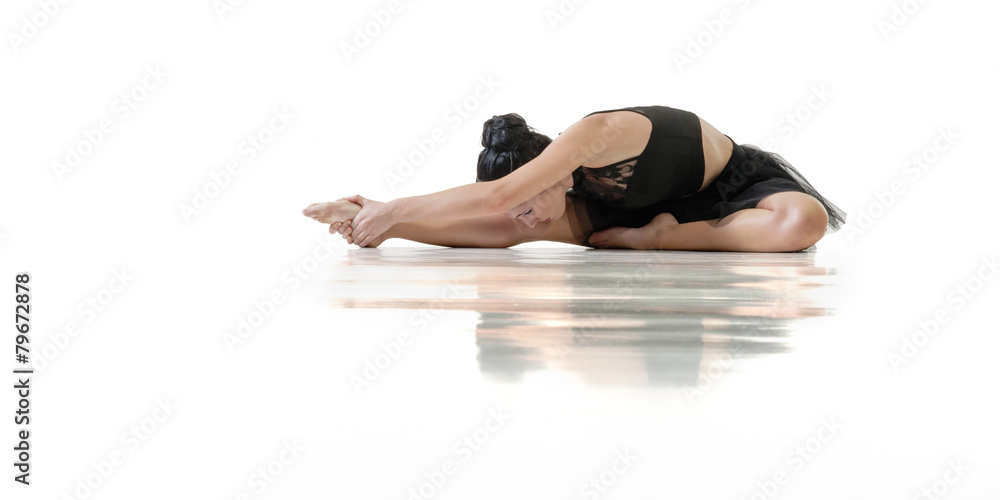 Fototapeta premium Young alternative ballerina stretching isolated on white