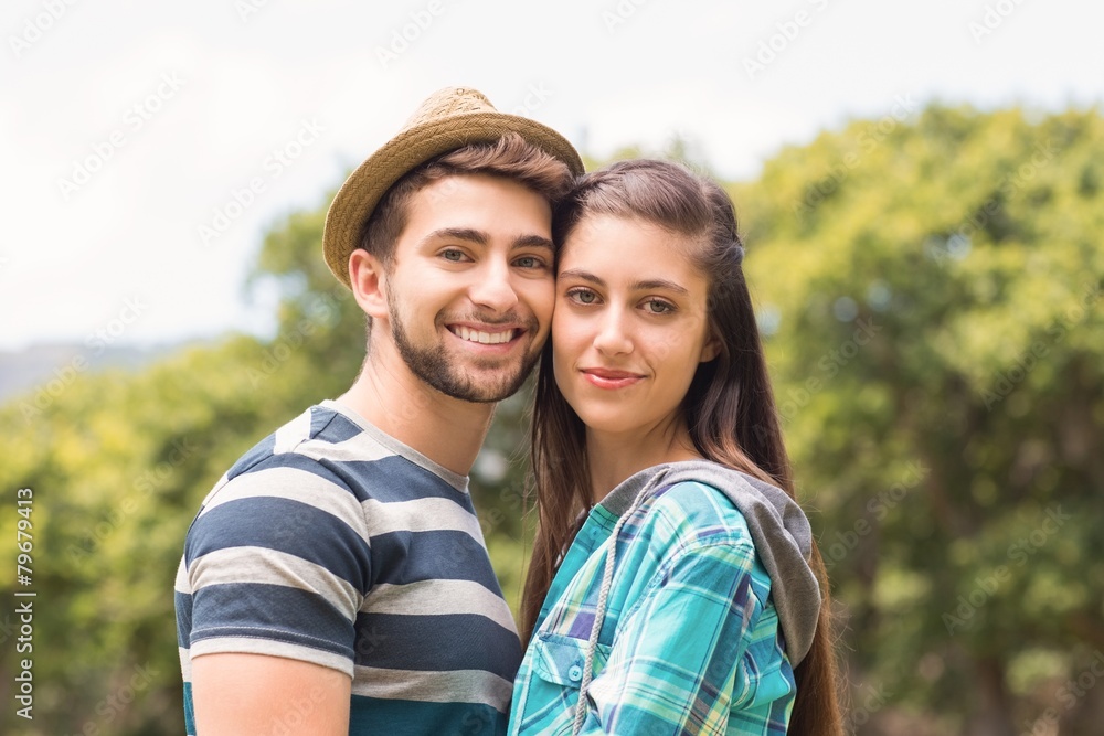 Fototapeta premium Young couple smiling at camera