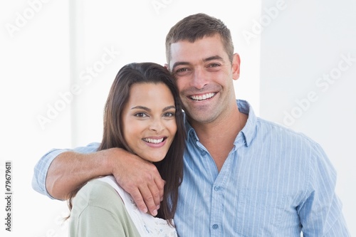Loving couple smiling at home © WavebreakmediaMicro