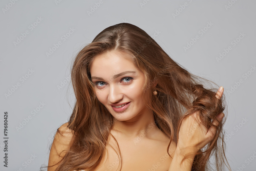 A beauty girl, on gray background A beauty girl, on gray background