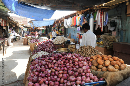 Indian vendors and customers in the Devaraja vegetable market