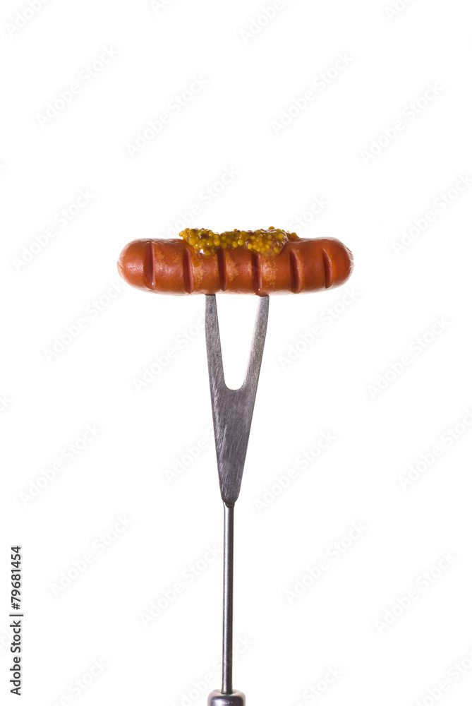 Grilled Sausage on Fork isolated on white Grilled Sausage on Fork isolated on white