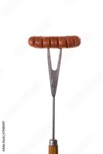 Grilled Sausage on Fork isolated on white