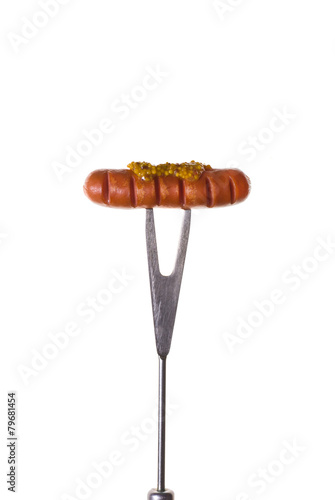 Grilled Sausage on Fork isolated on white