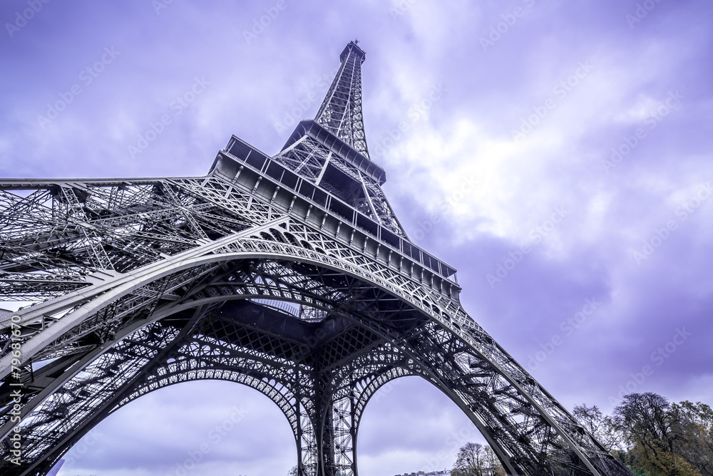 Eiffel Tower scenic bottom view. Purple sky
