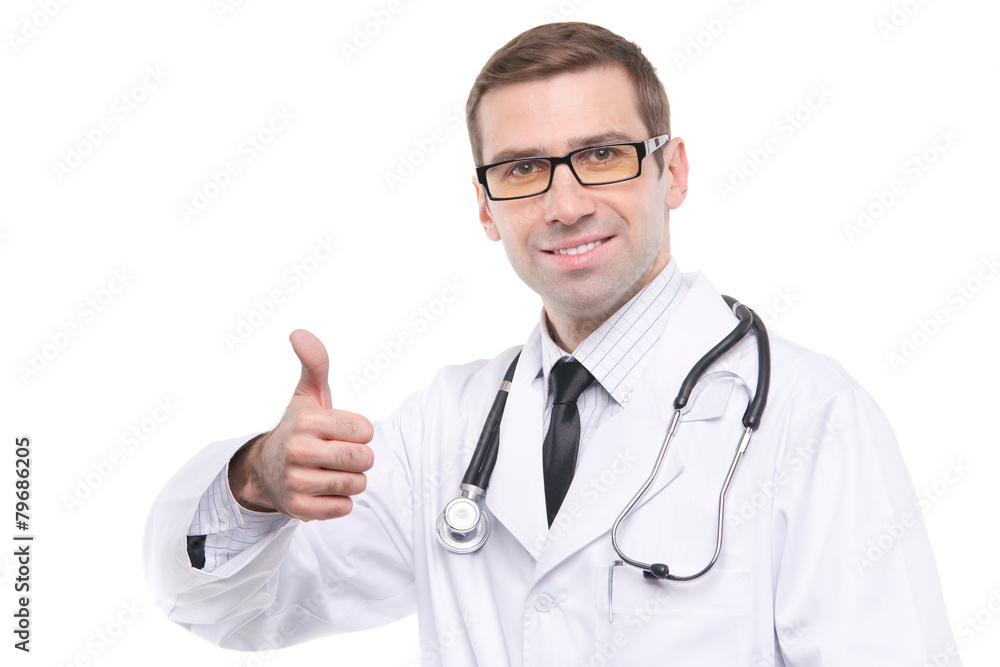 Happy male doctor with thumbs up isolated on white background Happy male doctor with thumbs up isolated on white background