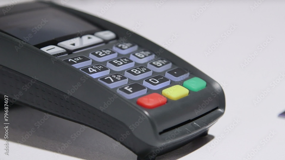 Dolly: receipt coming out of credit card reader Dolly: receipt coming out of credit card reader