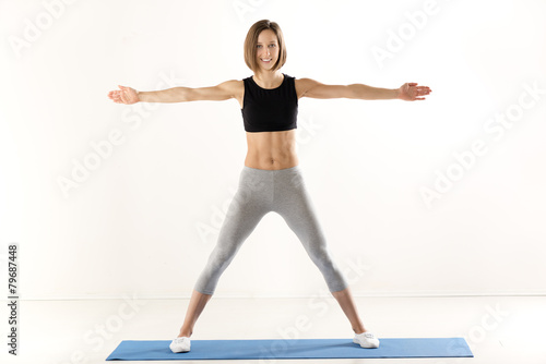 Girl Exercise With Outstretched Arms