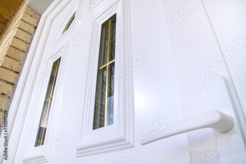 White plastic door on front house