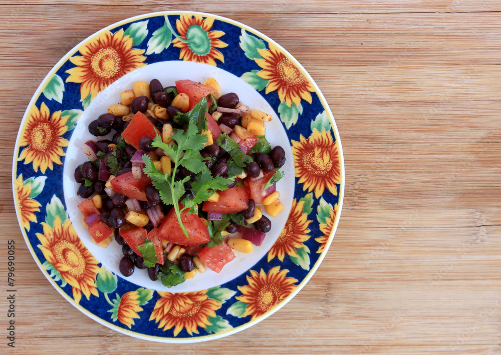 Black bean salad in sunflower plate Black bean salad in sunflower plate
