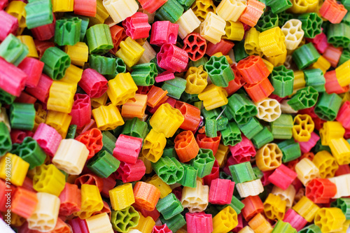 Background of colorful pasta as texture, close-up.