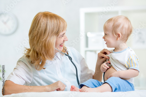 doctor examining heartbeat ...