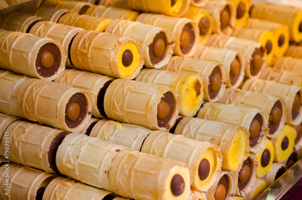 Tasty wafer rolls with chocolate and vanilla cream Tasty wafer rolls with chocolate and vanilla cream