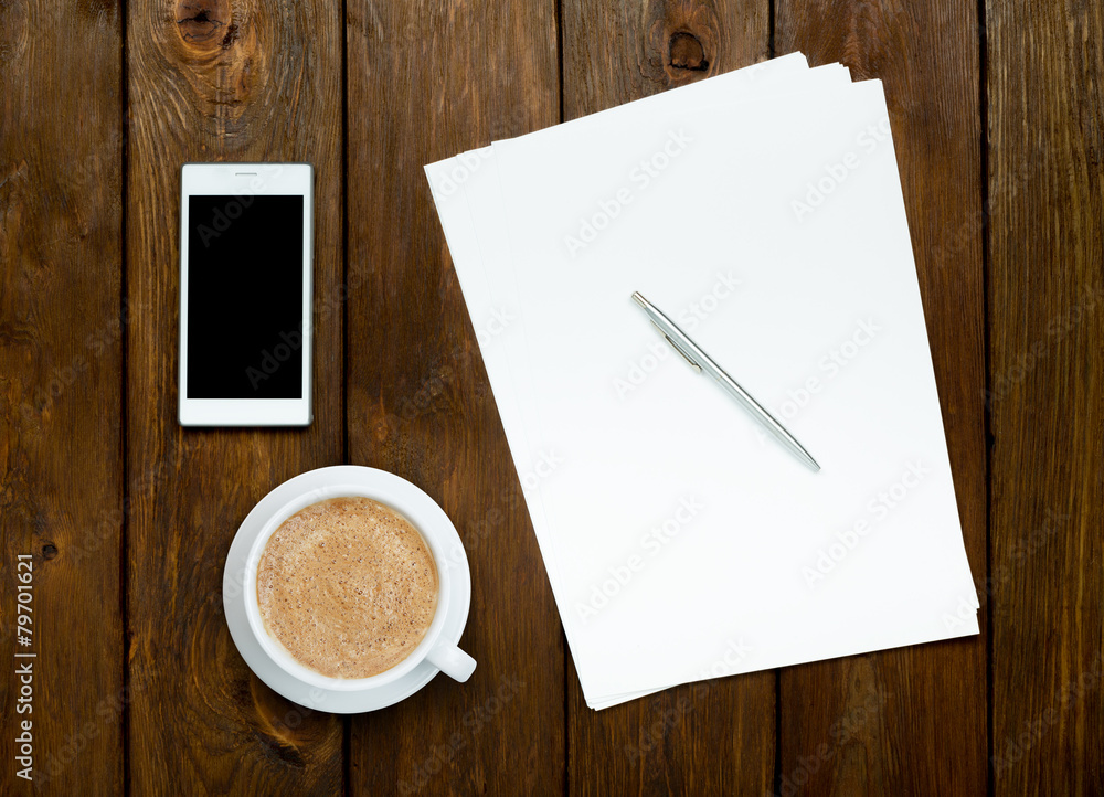Smartphone, coffee and paper sheets Smartphone, coffee and paper sheets