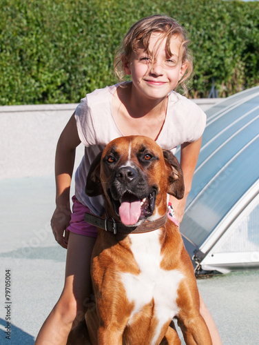 Obraz na płótnie Happy girl with her dog w salonie