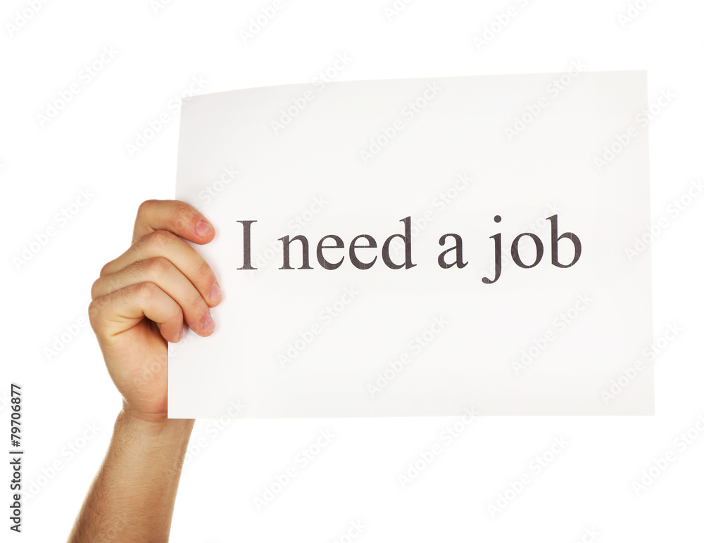 Sheet of paper with inscription I need a job in male hand Sheet of paper with inscription I need a job in male hand
