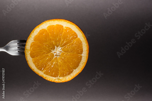 Orange on fork