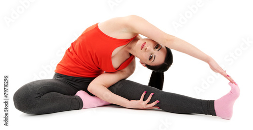 Young woman doing yoga isolated on white