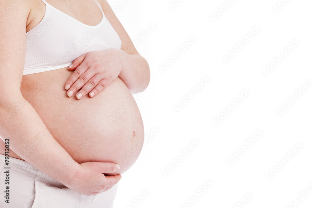 Close up of a pregnant belly, isolated on white background Close up of a pregnant belly, isolated on white background