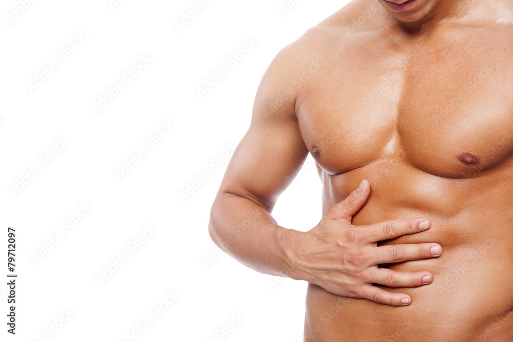 Muscle man with stomach pain, isolated on white backg Muscle man with stomach pain, isolated on white backg