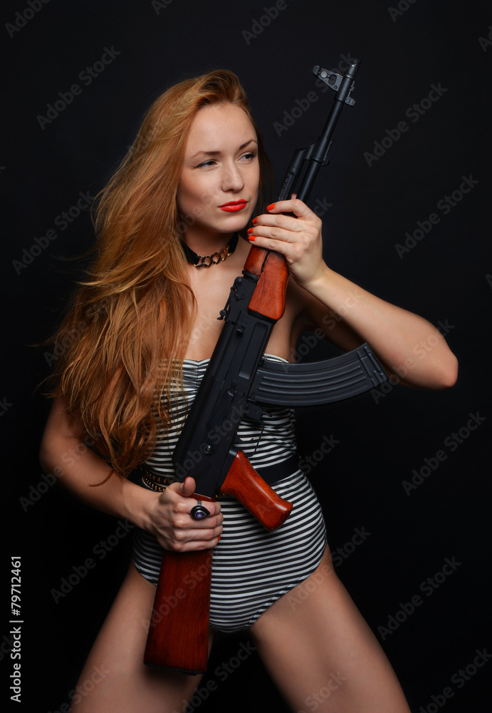 sexy fashion glamour woman holding up her weapon assault rifle g sexy fashion glamour woman holding up her weapon assault rifle g