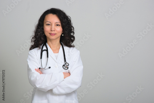 Obraz na plátne Asian female doctor with stethoscope