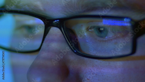 Wallpaper Mural The man look through glasses at monitor Torontodigital.ca