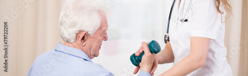 Elder patient training with dumbbell