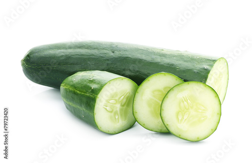 Cucumber and slices isolated over white background