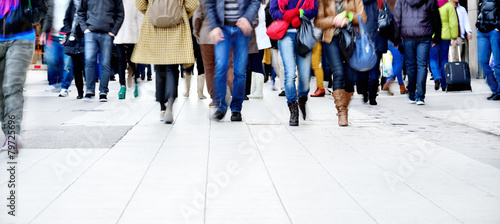 Motion blurred pedestrians on walking / shopping street