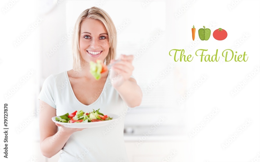 Good looking woman eating salad Good looking woman eating salad
