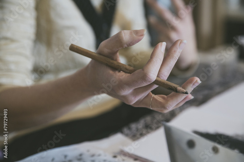 Closeup of artist hand holding pencil and making gesture