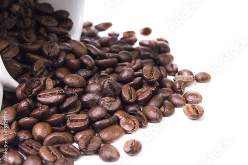 scattered grains of black organic coffee