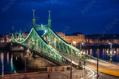 The Liberty bridge and the moving traffic at night lights, Budapest, Hungary