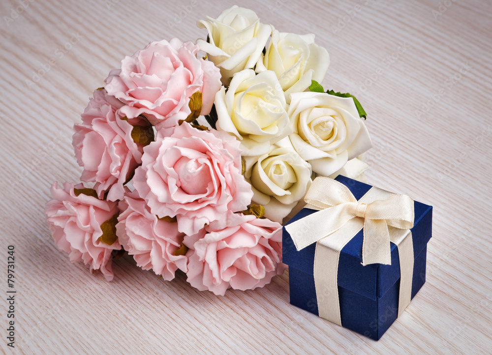 roses and blue gift box