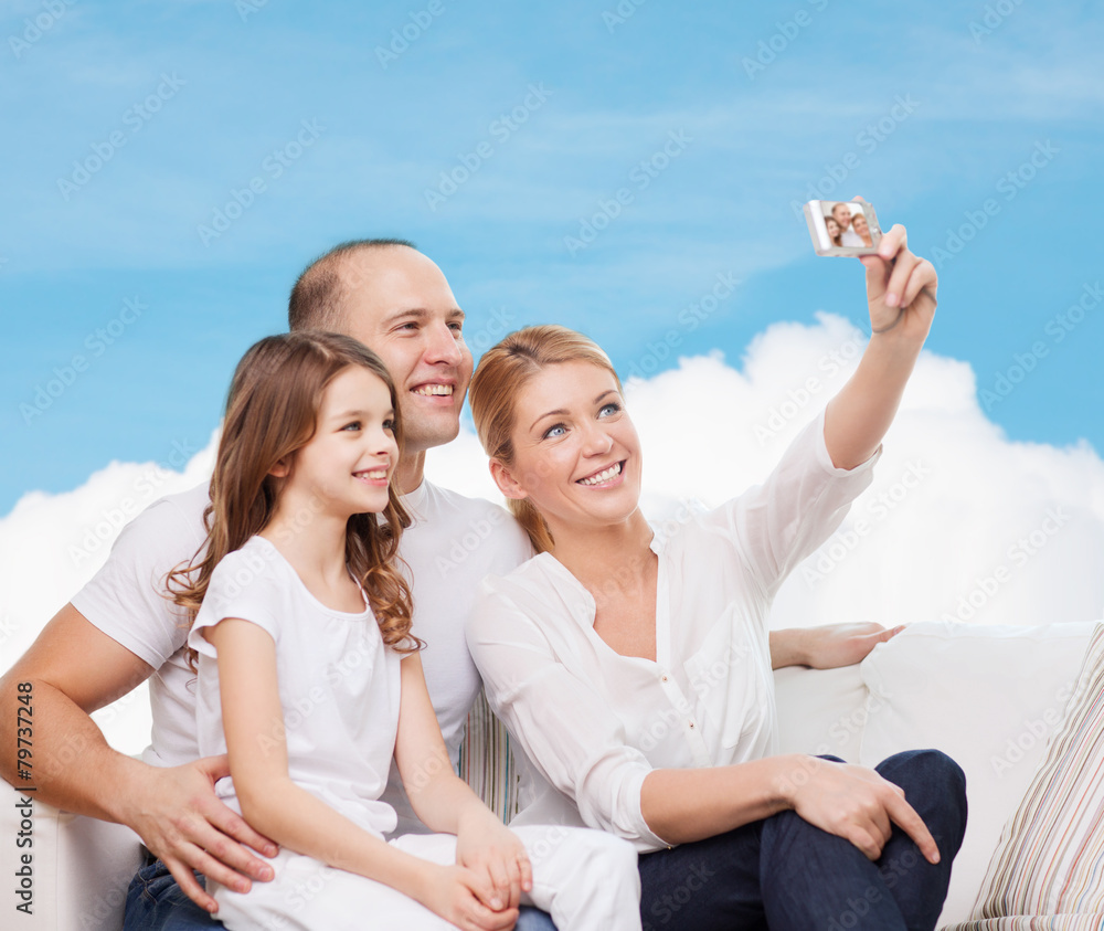 Obraz premium happy family with camera at home