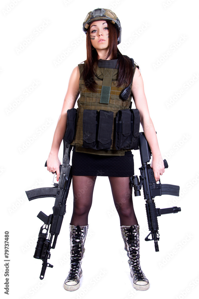 Woman in a military camouflage with two assault rifles Woman in a military camouflage with two assault rifles