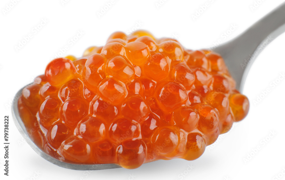 Red caviar on the silver spoon. Red caviar on the silver spoon.