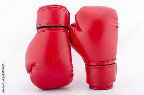 Red boxing gloves isolated on white © piyathep