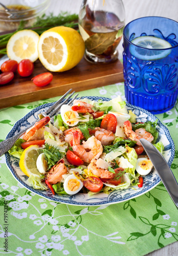 Fresh shrimps, eggs and vegetables salad