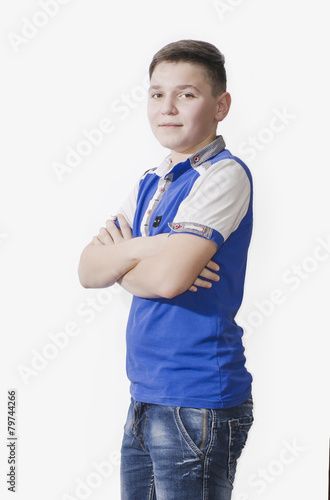 Cheerful teenager on a white background