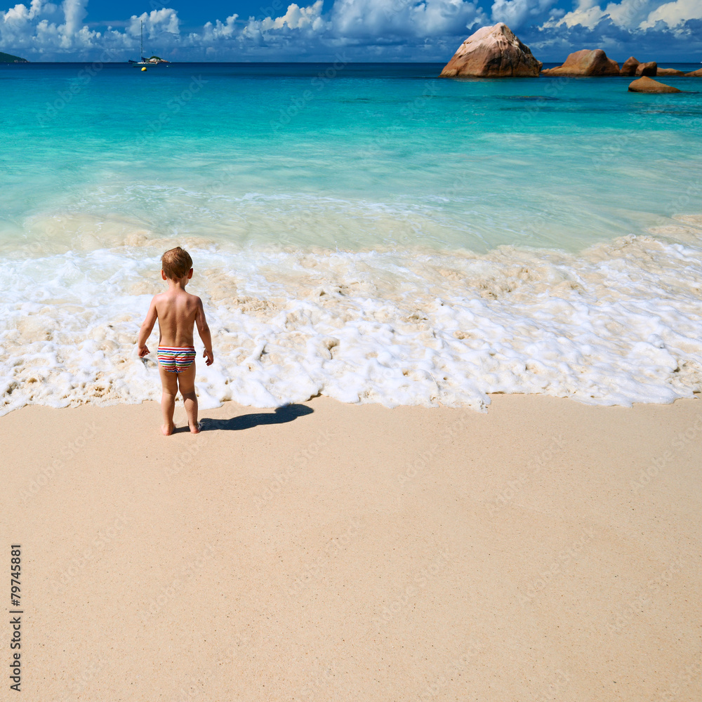Two year old boy playing on beach Two year old boy playing on beach